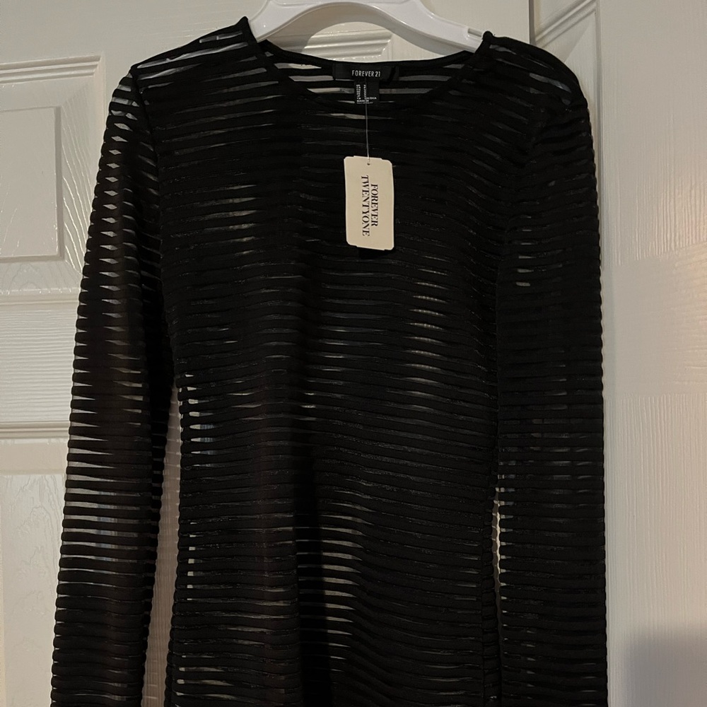 Forever 21 brand new with tag. Women’s Black, sheer blouse.